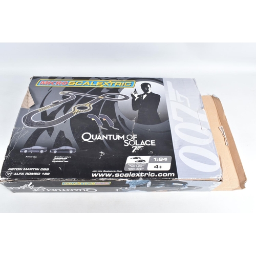 172 - FIVE BOXED SCALEXTRIC SETS, to include a Quantum of Solace 007 set, numbered G1044, set includes two... 