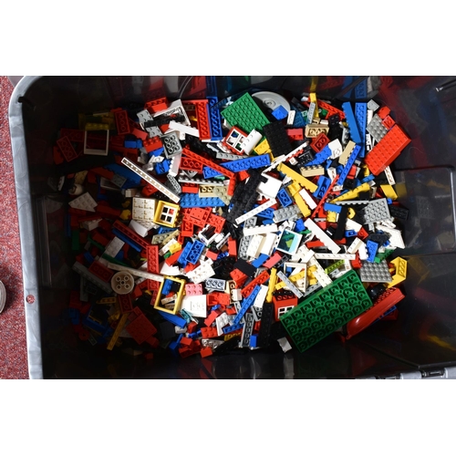 185 - TWO PLASTIC CRATES OF LOOSE LEGO PARTS, including both modern and vintage pieces, quantity of instru... 