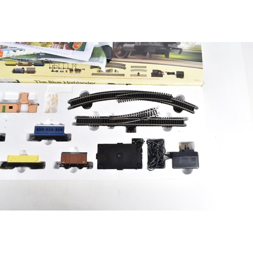 356 - A BOXED HORNBY RAILWAYS OO GAUGE THE BLUE HIGHLANDER SET, No.R1101, comprising class 0F 'Pug' saddle... 