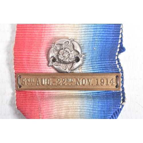 358 - A 1914 WWI STAR WITH BAR AND ROSETTE, a miniature WWI trio of medals, ribbon bar with rosette, the s... 