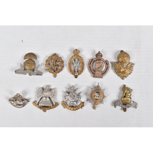 361 - A COLLECTION OF MILITARY CAP AND COLLAR BADGES, these include RE, North Staffs, RAMC, RA, Royal Scot... 