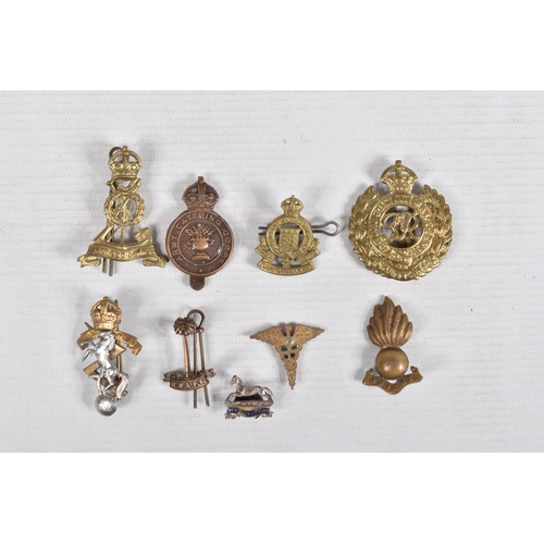 361 - A COLLECTION OF MILITARY CAP AND COLLAR BADGES, these include RE, North Staffs, RAMC, RA, Royal Scot... 