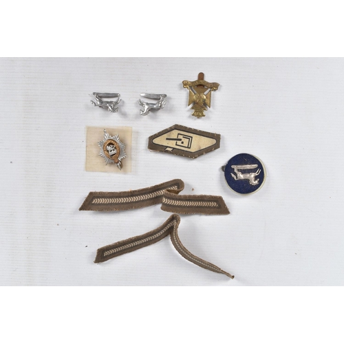 362 - A WOODEN BOX CONTAINING TWO SETS OF WWII MEDALS, cap badges, formation patches and other military ep... 