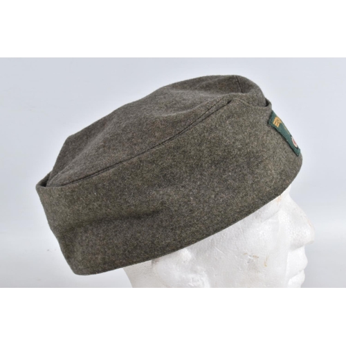 364 - TWO WWII ERA STYLE GARMAN ARMY HATS, the first is a field cap with Luftwaffe insignia to the front a... 