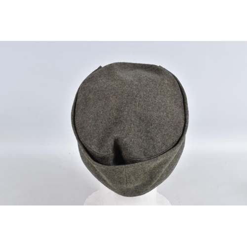 364 - TWO WWII ERA STYLE GARMAN ARMY HATS, the first is a field cap with Luftwaffe insignia to the front a... 