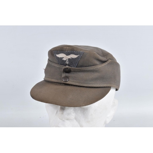 364 - TWO WWII ERA STYLE GARMAN ARMY HATS, the first is a field cap with Luftwaffe insignia to the front a... 