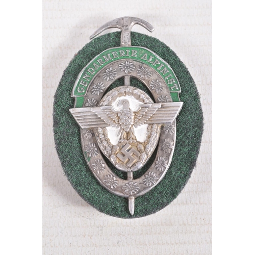 373 - A GERMAN THIRD REICH ALPINE POLICE GENAMERIE BADGE, this is flat backed and the pin is near the top,... 