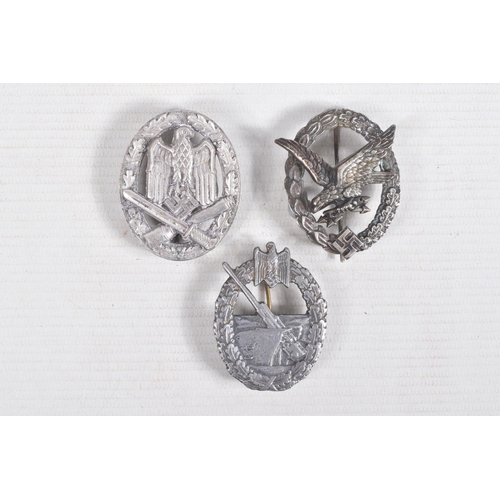 381 - THREE GERMAN AWARD BADGES, to include a general assault badge, a Kriegsmarine Coastal Artillery badg... 