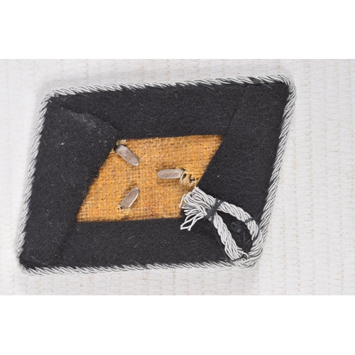 385 - THREE GERMAN UNIFORM ITEMS, to include a collar patch, Tunic badge and a Luftwaffe front flight clas... 