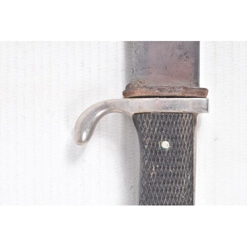 387 - A GERMAN HJ KNIFE IN ITS ORIGINAL SCABBARD, the motto Blut Und Ehre is on one side and the other sid... 