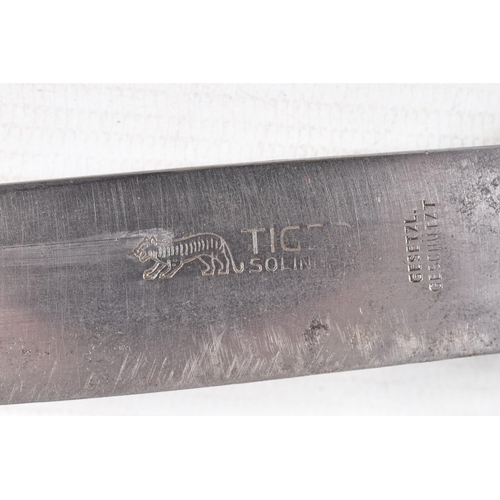 387 - A GERMAN HJ KNIFE IN ITS ORIGINAL SCABBARD, the motto Blut Und Ehre is on one side and the other sid... 