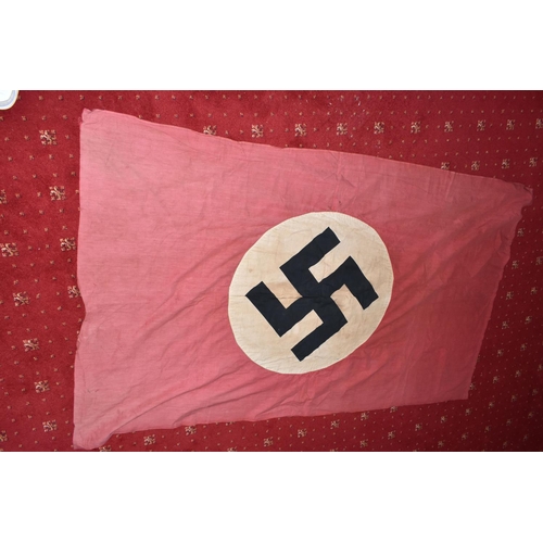 390 - A LARGE WWII ERA GERMAN FLAG, this has faded and was bought back from WWII by the vendors family mem... 