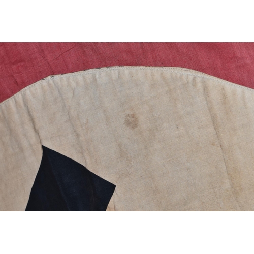 390 - A LARGE WWII ERA GERMAN FLAG, this has faded and was bought back from WWII by the vendors family mem... 