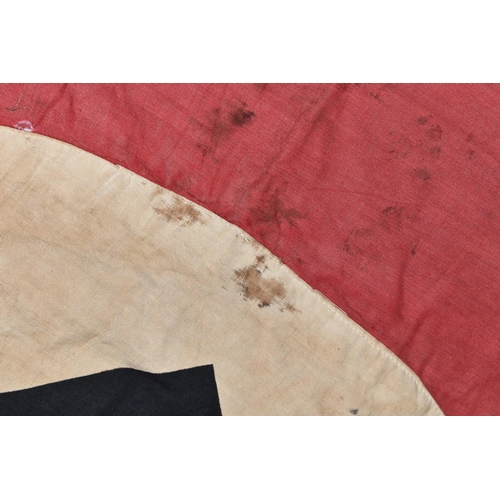 390 - A LARGE WWII ERA GERMAN FLAG, this has faded and was bought back from WWII by the vendors family mem... 