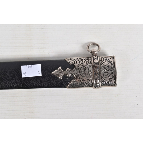 397 - A DECORATIVE DAGGER WITH A CARVED HANDLE WITH EMBOSSED BLADE, this comes in a metal banded leather s... 