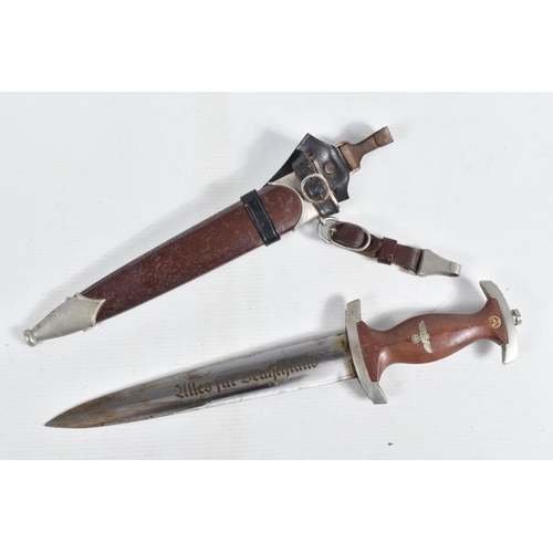 399 - A GERMAN SA DAGGER WITH BELT AND BUCKLE, this dagger has the stamp for Carl Schmidt Sohn Solingen on... 