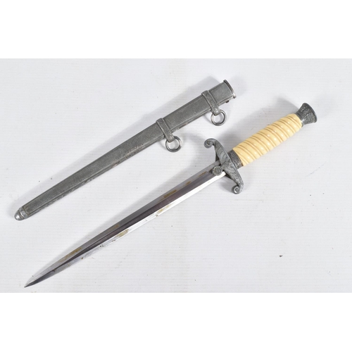 401 - A GERMAN ARMY DAGGER MADE BY WKC OF SOLIGEN, this has got its original scabbard and the blade is cle... 