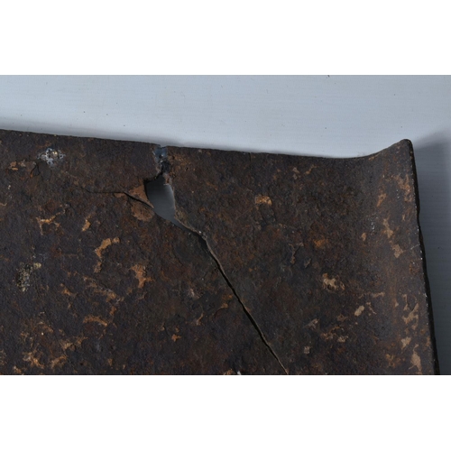 413 - A WWI RELIC OF A METAL SNIPERS PROTECTIVE PLATE, split in two with numerous cracks throughout, aged ... 