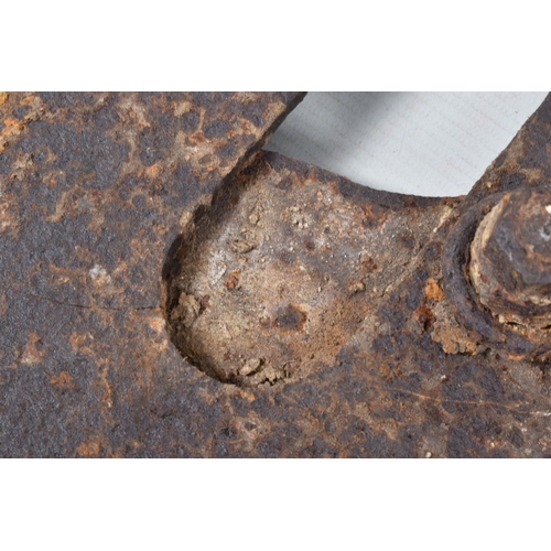 413 - A WWI RELIC OF A METAL SNIPERS PROTECTIVE PLATE, split in two with numerous cracks throughout, aged ... 