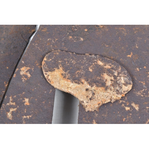 413 - A WWI RELIC OF A METAL SNIPERS PROTECTIVE PLATE, split in two with numerous cracks throughout, aged ... 