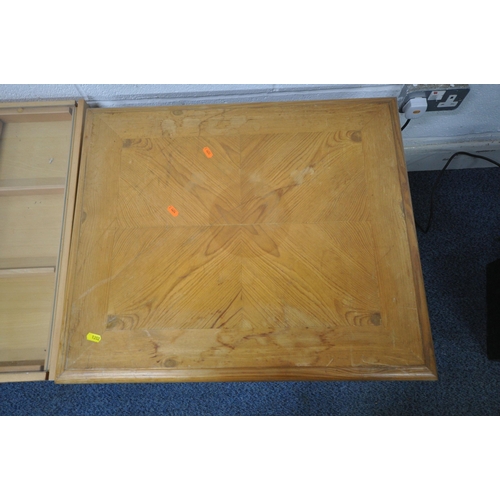 1202 - A MODERN BEECH GLASS TOP COFFEE TABLE, with a single drawer to each end and a selection of dividers,... 