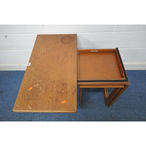 1203 - A.H MCINTOSH AND CO LTD, KIRKCALDY, SCOTLAND, A MID CENTURY TEAK TRIFORM NEST OF THREE TABLES, with ... 