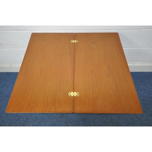 1203 - A.H MCINTOSH AND CO LTD, KIRKCALDY, SCOTLAND, A MID CENTURY TEAK TRIFORM NEST OF THREE TABLES, with ... 