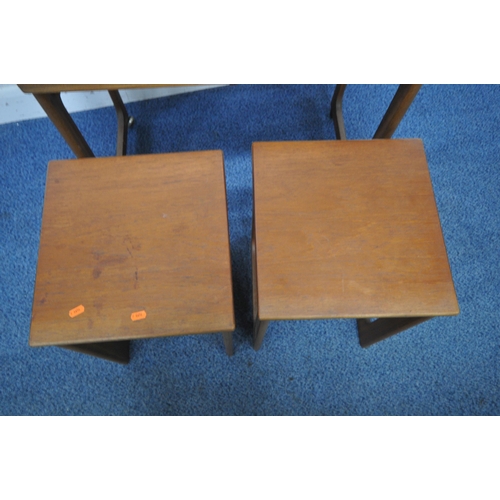 1203 - A.H MCINTOSH AND CO LTD, KIRKCALDY, SCOTLAND, A MID CENTURY TEAK TRIFORM NEST OF THREE TABLES, with ... 