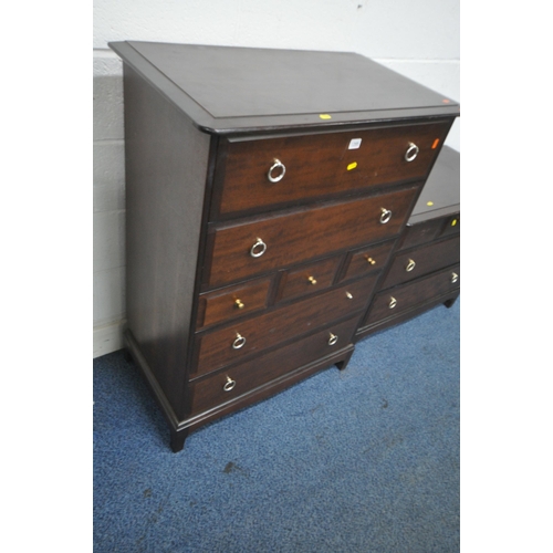 1205 - A STAG MINSTREL CHEST OF SEVEN DRAWERS, width 82cm x depth 47cm x height 113cm, along with a matchin... 