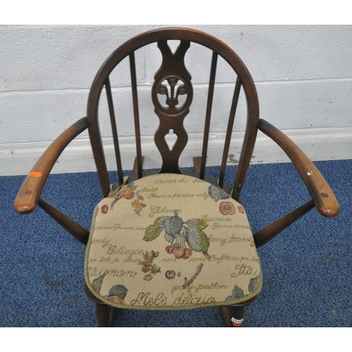 1210 - LUCIAN ERCOLANI, A MID CENTURY DARK ELM AND BEECH FLEUR DE LIS CHILDS ROCKING CHAIR, width 61cm x de... 