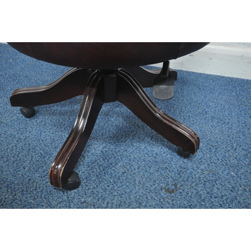 1219 - AN OXBLOOD BUTTONED LEATHER SWIVEL OFFICE CHAIR, width 61cm x depth 65cm x height 79cm (condition re... 