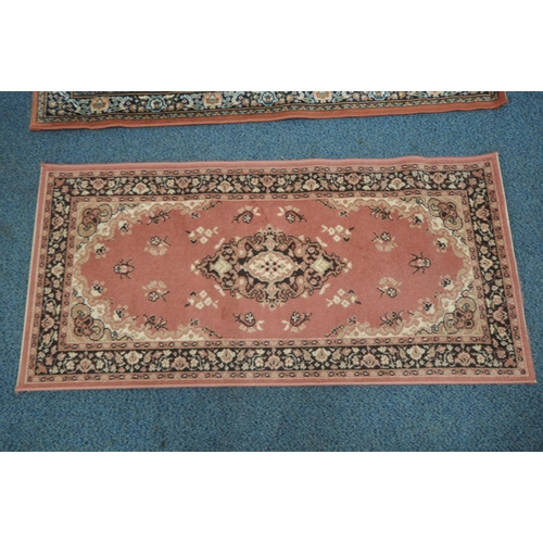 1224 - A SMALL RECTANGULAR LAURA RUG, with beige field, central medallion, surrounded by a multi-strap bord... 