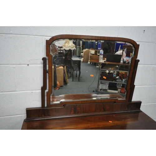 1236 - A REPRODUCTION MAHOGANY DRESSING TABLE, with a single bevelled edge mirror, an arrangement of five d... 