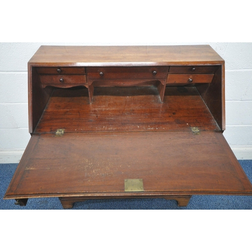 1237 - A 19TH CENTURY FLAME MAHOGANY BUREAU, the fall front door enclosing a fitted interior, above four lo... 