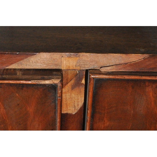 1237 - A 19TH CENTURY FLAME MAHOGANY BUREAU, the fall front door enclosing a fitted interior, above four lo... 