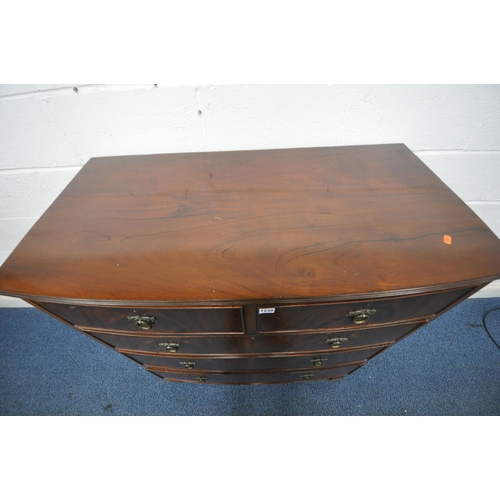 1239 - A REPRODUCTION MAHOGANY BOW FRONT CHEST OF TWO SHORT OVER THREE LONG DRAWERS, on bracket feet, width... 