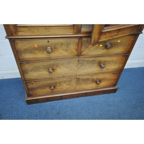 1241 - A 19TH CENTURY FLAME MAHOGANY LINEN PRESS, fitted with double doors, atop a base with two short over... 