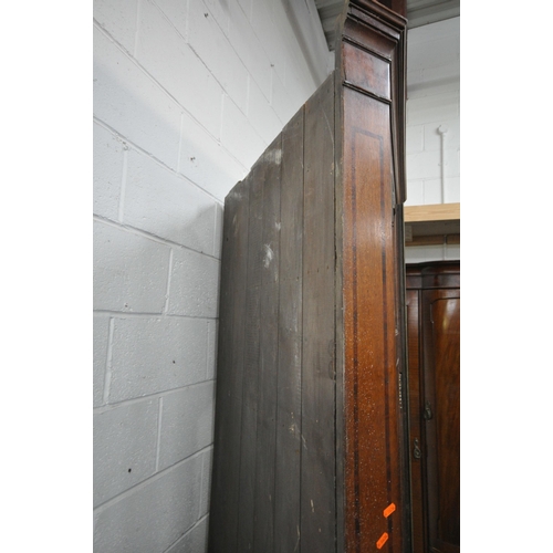 1244 - A LARGE GEORGIAN OAK CORNER CUPBOARD, fitted with four doors, enclosing shelves, width 114cm x depth... 