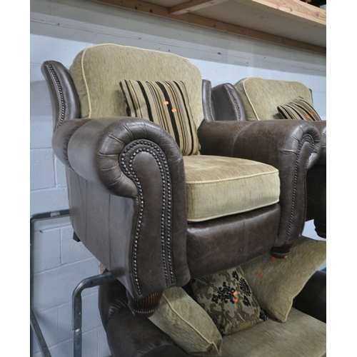 1245 - A BROWN LEATHER AND CREAM FABRIC UPHOLSTERED THREE PIECE LOUNGE SUITE, comprising a wide armchair, w... 