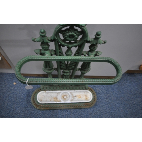 1246 - A GREEN PAINTED CAST IRON UMBRELLA / STICK STAND, with a white painted drip tray, width 48cm x depth... 