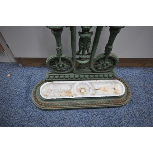 1246 - A GREEN PAINTED CAST IRON UMBRELLA / STICK STAND, with a white painted drip tray, width 48cm x depth... 