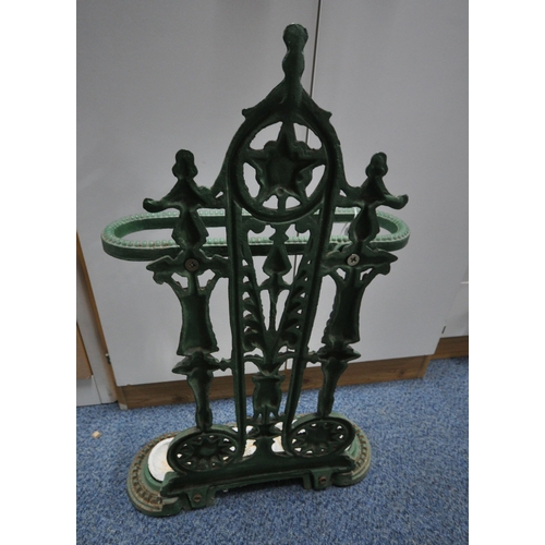 1246 - A GREEN PAINTED CAST IRON UMBRELLA / STICK STAND, with a white painted drip tray, width 48cm x depth... 