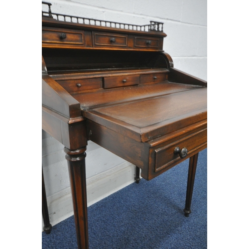 1248 - POSSIBLY THEODORE ALEXANDER, A GOOD QUALITY REPRODUCTION MAHOGANY WRITING DESK, with a raised galler... 