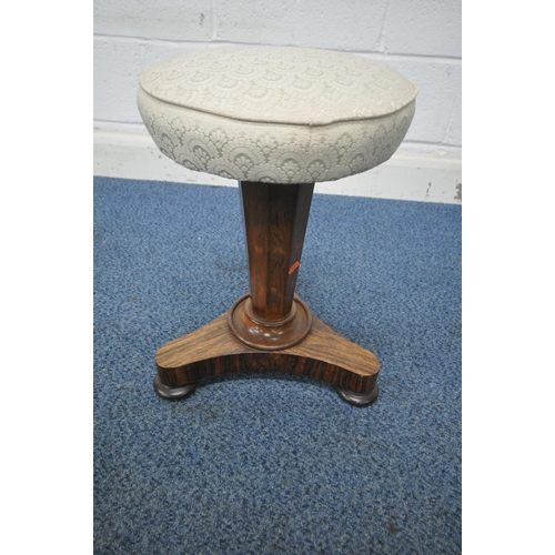 1250 - A REGENCY ROSEWOOD SWIVEL PIANO STOOL, with beige upholstered circular seat, on an octagonal support... 