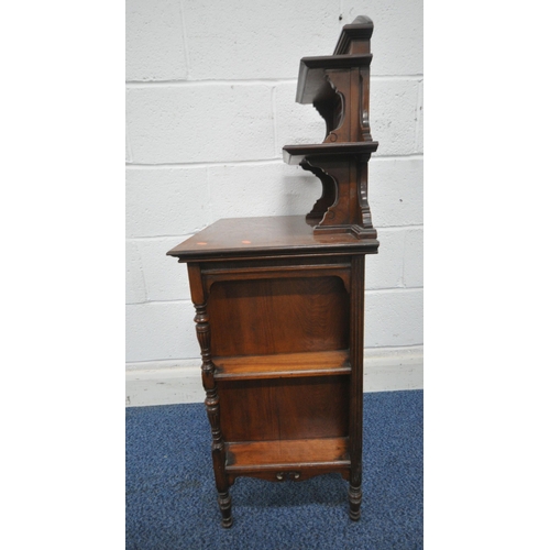 1251 - AN EDWARDIAN MAHOGANY PURDONIUM, the raised back with two shelves, atop a base with a fall front sto... 