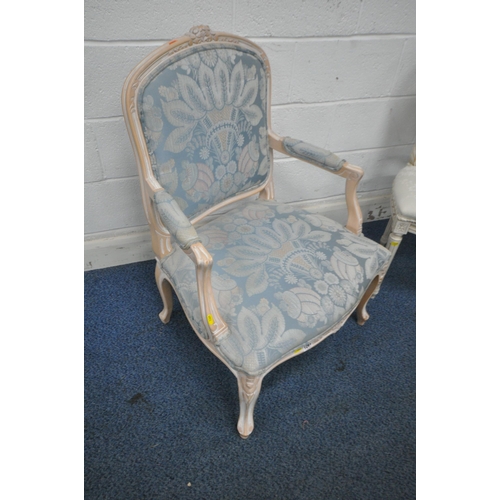 1261 - A FRENCH STYLE WIDE ARMCHAIR, with blue upholstery, open armrests, raised on front cabriole legs, wi... 