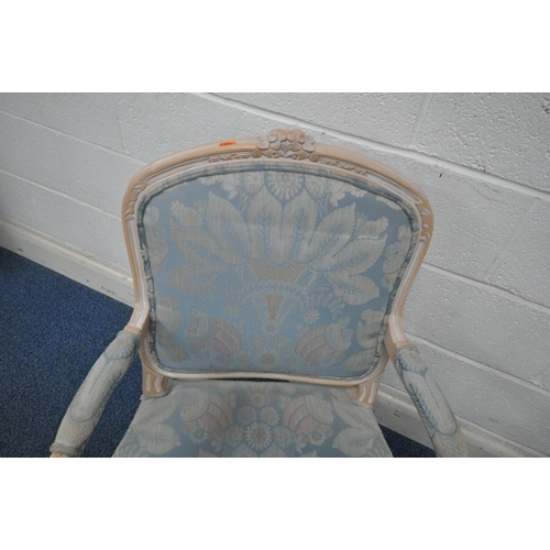 1261 - A FRENCH STYLE WIDE ARMCHAIR, with blue upholstery, open armrests, raised on front cabriole legs, wi... 