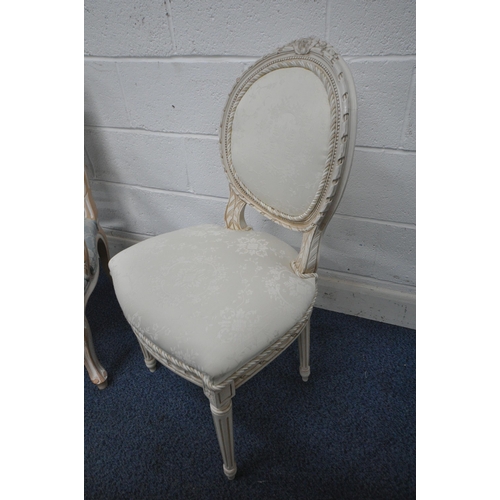 1261 - A FRENCH STYLE WIDE ARMCHAIR, with blue upholstery, open armrests, raised on front cabriole legs, wi... 