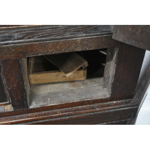 1263 - A GEORGIAN AND LATER OAK CORNER CUPBOARD, with a single astragal glazed door, above a single drawer ... 