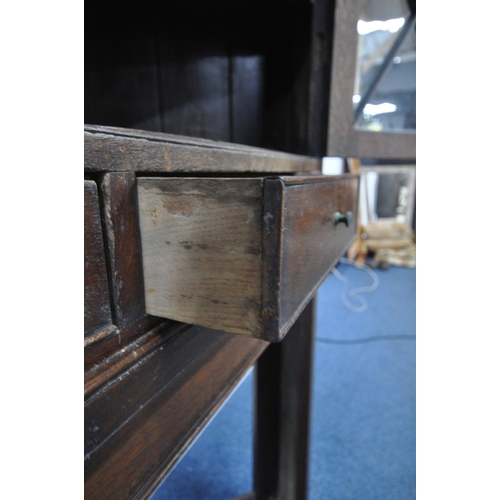 1263 - A GEORGIAN AND LATER OAK CORNER CUPBOARD, with a single astragal glazed door, above a single drawer ... 